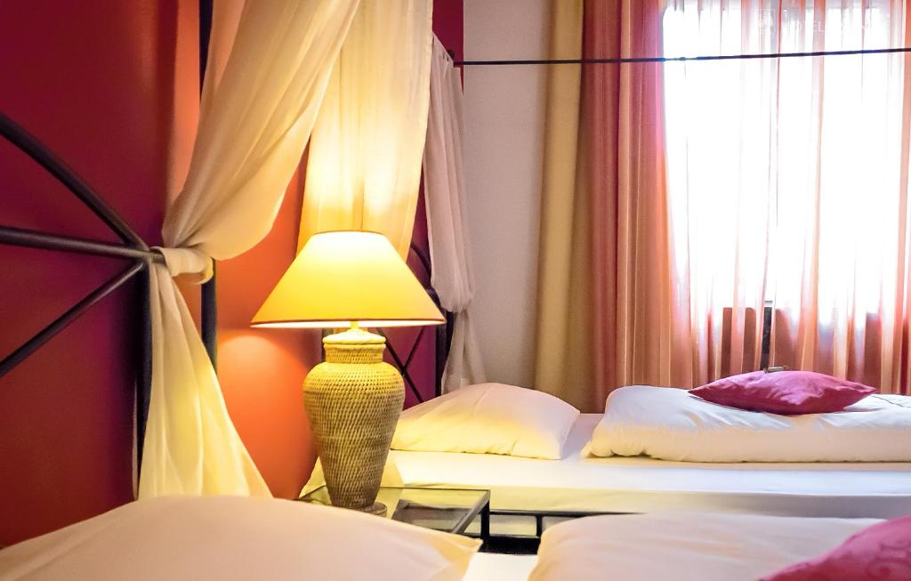 Postel nebo postele na pokoji v ubytování Hotel 3 Könige