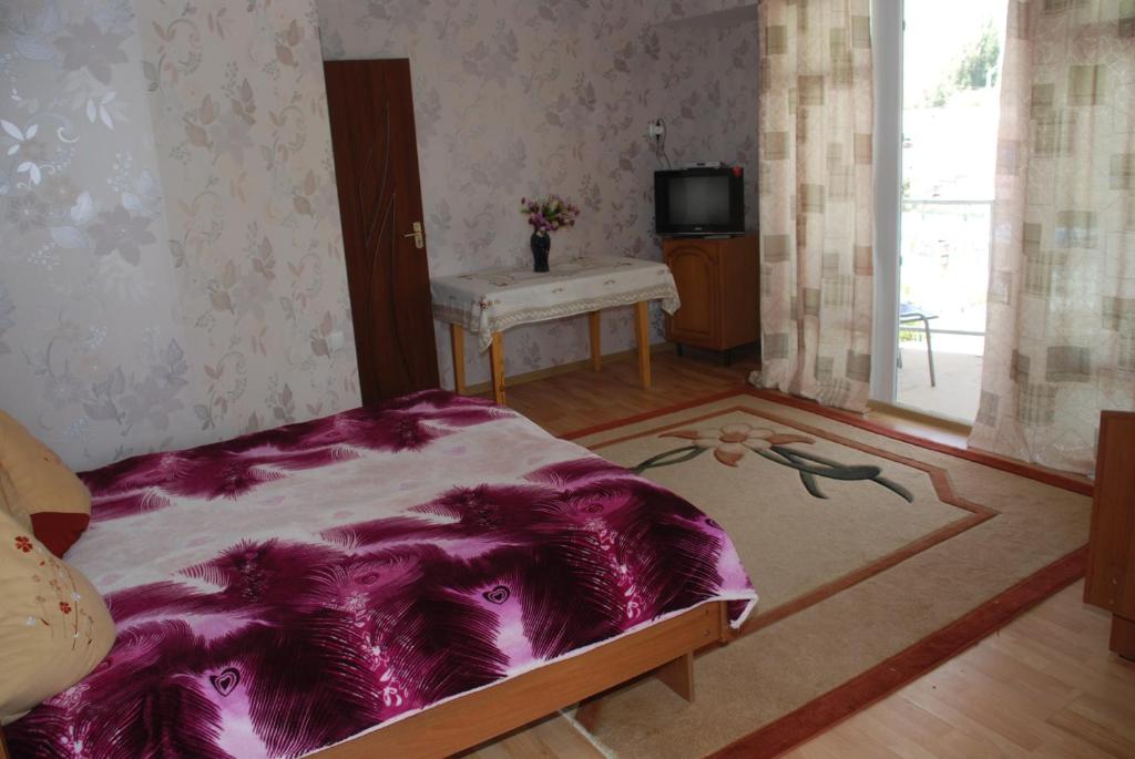 Postel nebo postele na pokoji v ubytování " У Татьяны"