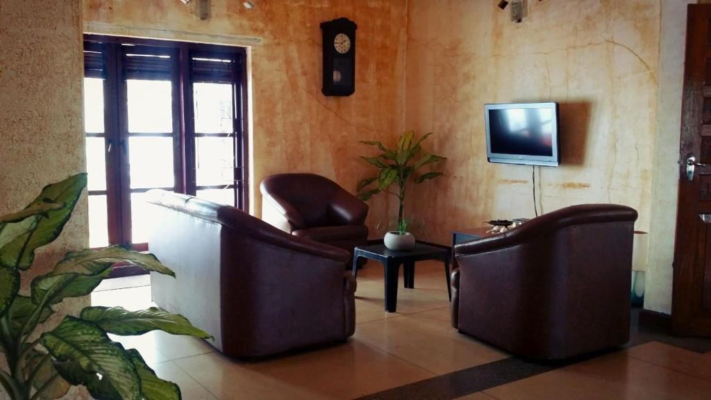 TV a/nebo společenská místnost v ubytování Saubagya Inn