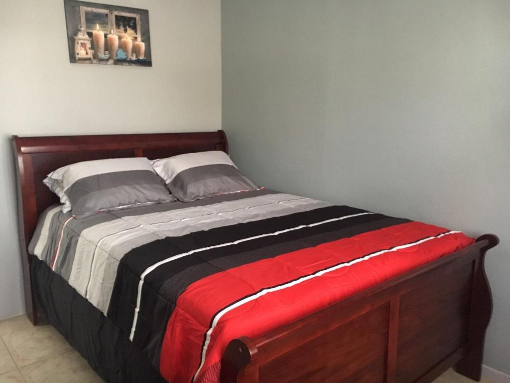 Postel nebo postele na pokoji v ubytování Rincon Boricua Apartments