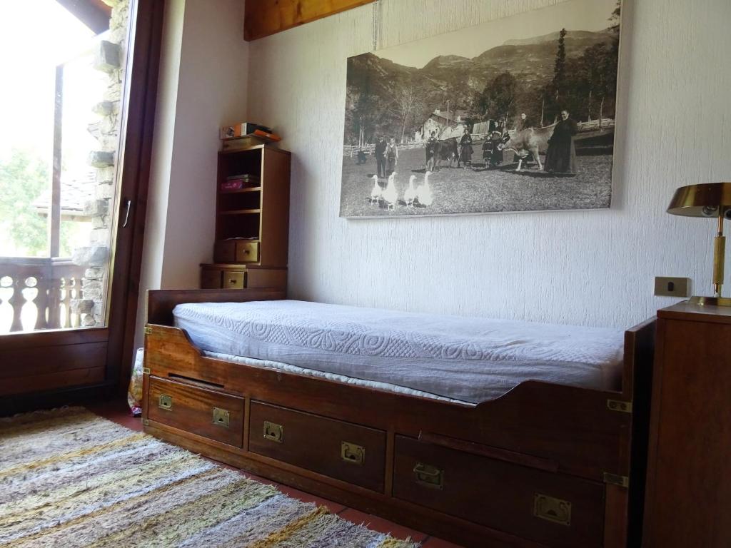 Postel nebo postele na pokoji v ubytování La Ruine - Morgex