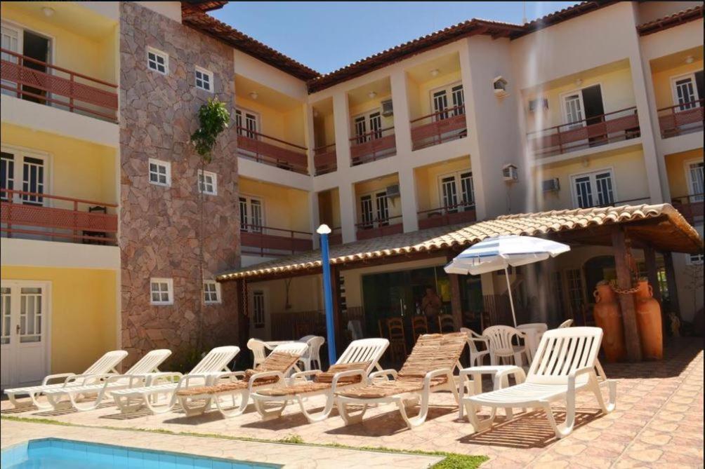 Bazén v ubytování Hotel Brisa dos Abrolhos nebo v jeho okolí