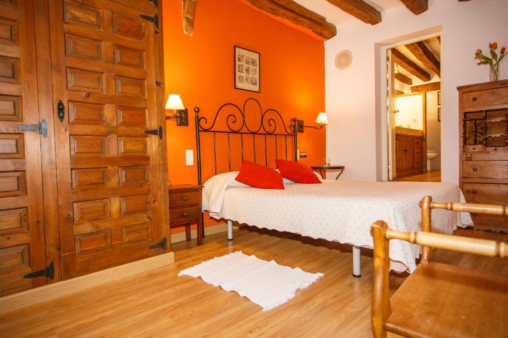 Posteľ alebo postele v izbe v ubytovaní El Bulín de Pedraza - Casa del Serrador