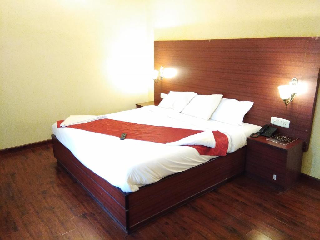 Postel nebo postele na pokoji v ubytování Berry Hills Resort