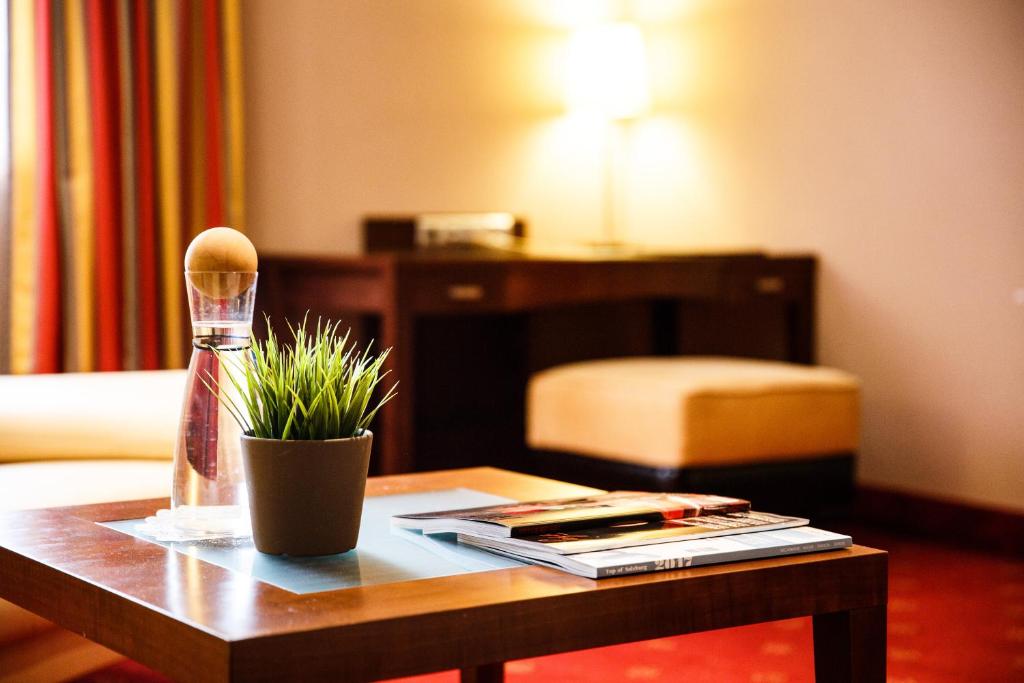 Posteľ alebo postele v izbe v ubytovaní Hotel Salzburg