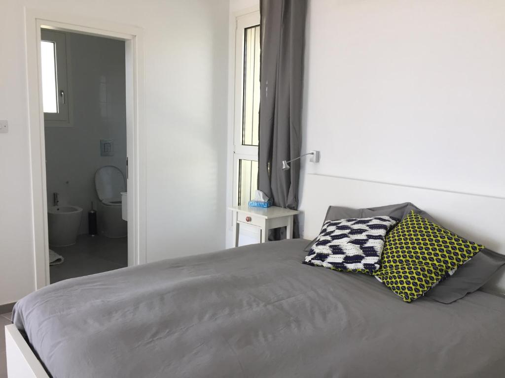 Postel nebo postele na pokoji v ubytování Casa Vacanze Baciata