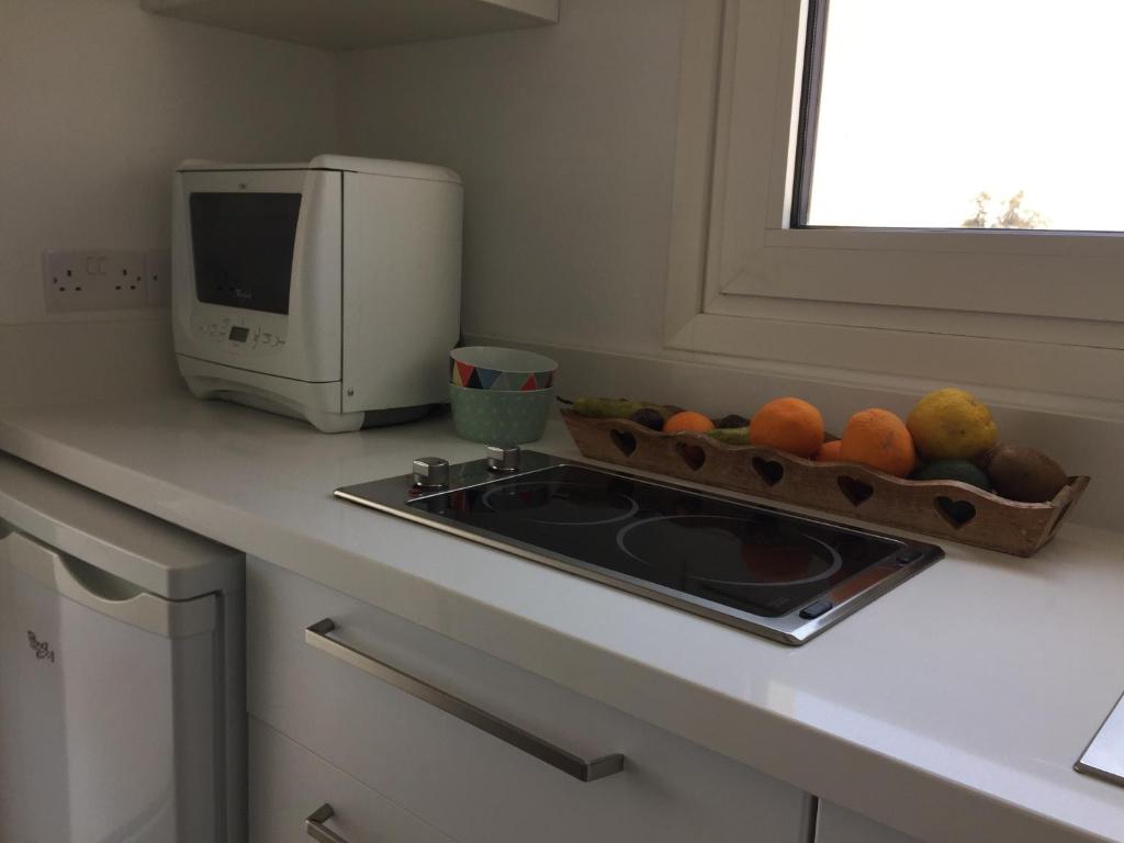 Kuchyň nebo kuchyňský kout v ubytování Casa Vacanze Baciata