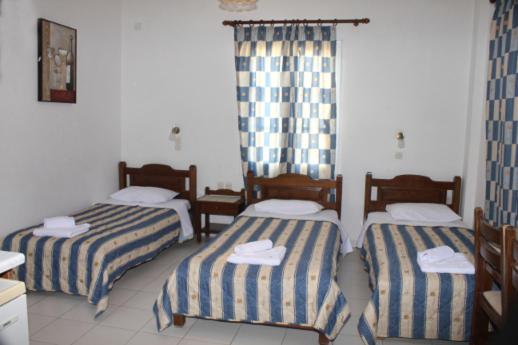 Postel nebo postele na pokoji v ubytování Villa Kriezi