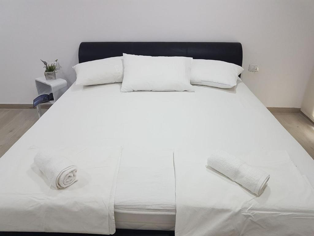 Postel nebo postele na pokoji v ubytování Rooms Lanterna