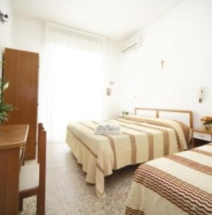 Postel nebo postele na pokoji v ubytování Guestrooms Ross