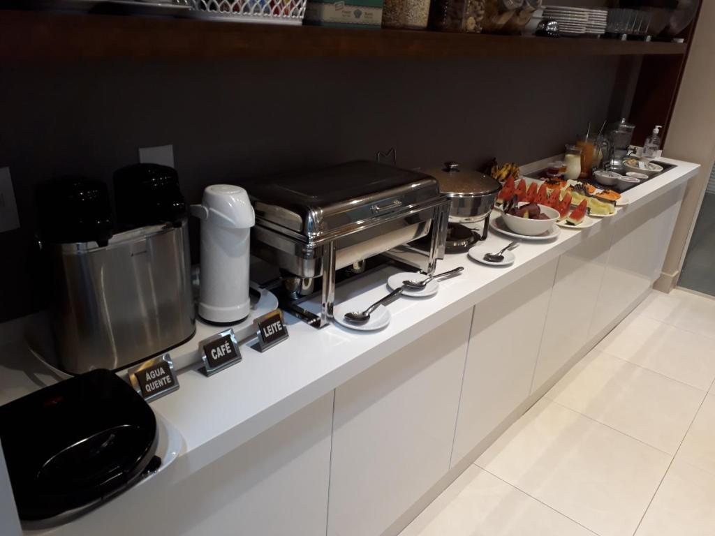 Kuchyň nebo kuchyňský kout v ubytování Ventura Hotel