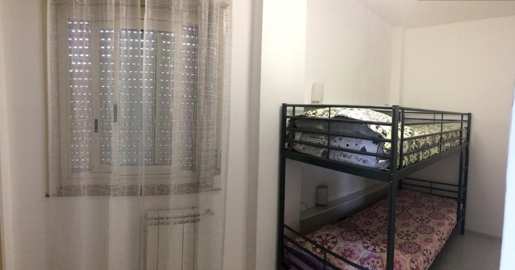 Posteľ alebo postele v izbe v ubytovaní Casa Vacanze il Gelsomino