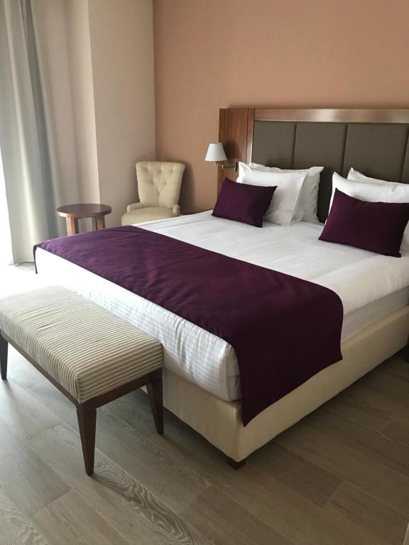 Postel nebo postele na pokoji v ubytování Xenon Hotel & SPA