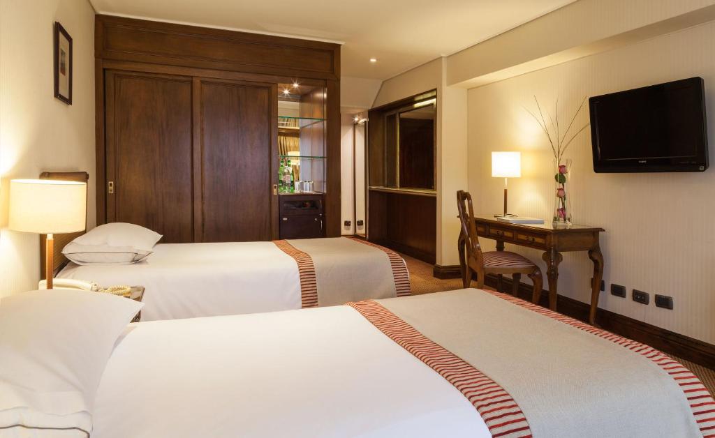 Postel nebo postele na pokoji v ubytování Hotel Plaza San Francisco