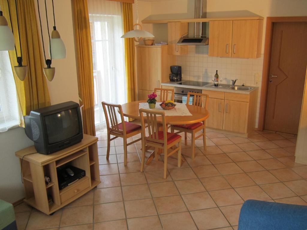 Kuchyň nebo kuchyňský kout v ubytování Appartement Millennium