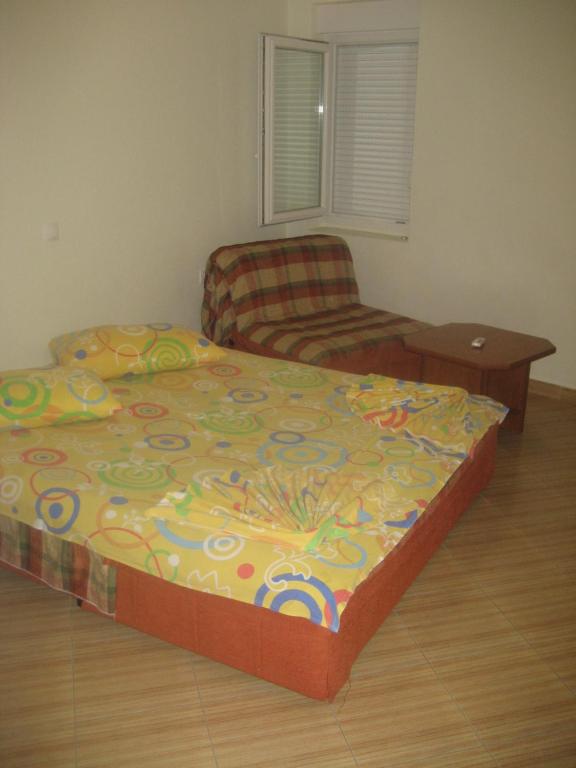 Postel nebo postele na pokoji v ubytování Guest House Vila Mimoza