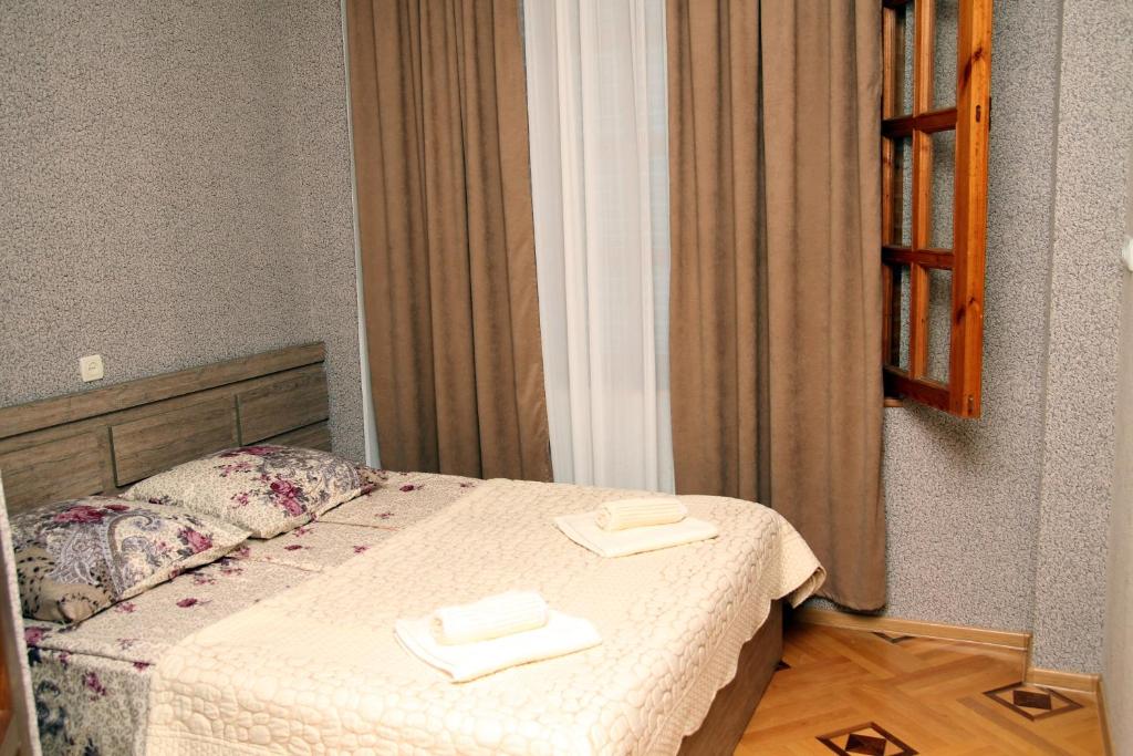 Postel nebo postele na pokoji v ubytování Guesthouse Fatima