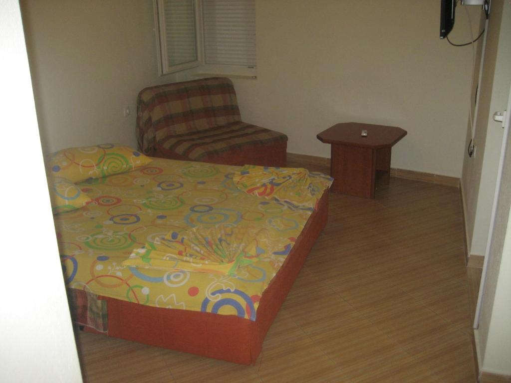 Postel nebo postele na pokoji v ubytování Guest House Vila Mimoza