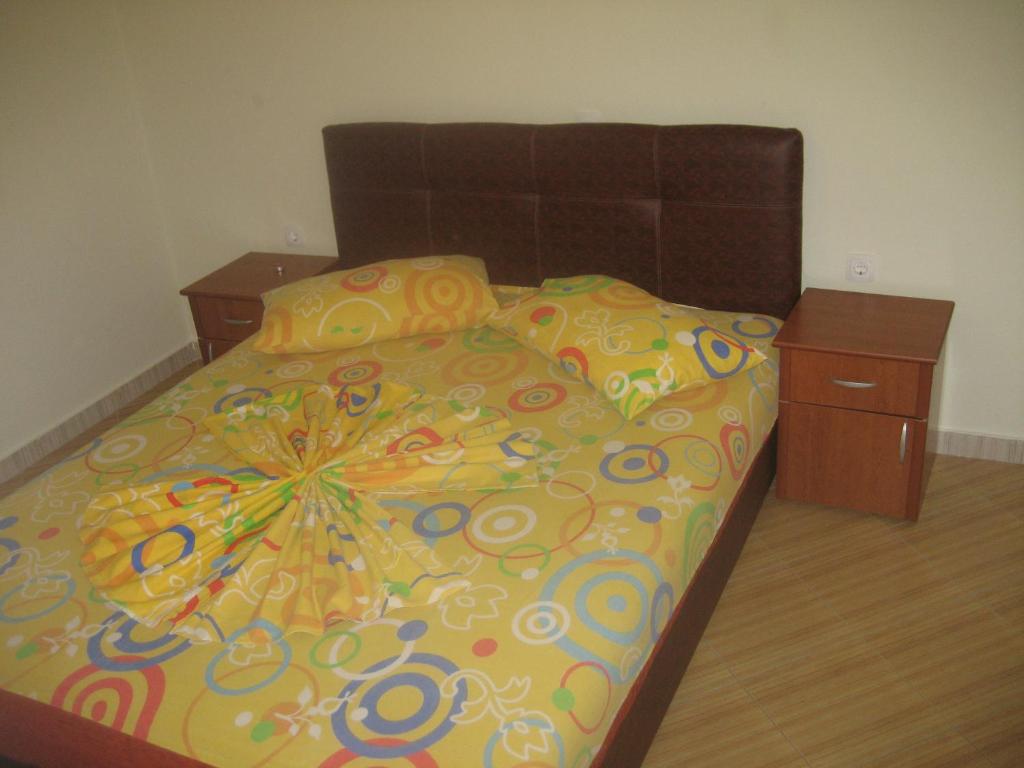 Postel nebo postele na pokoji v ubytování Guest House Vila Mimoza