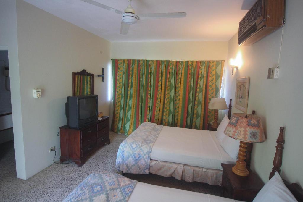 Postel nebo postele na pokoji v ubytování Sahara Hostel