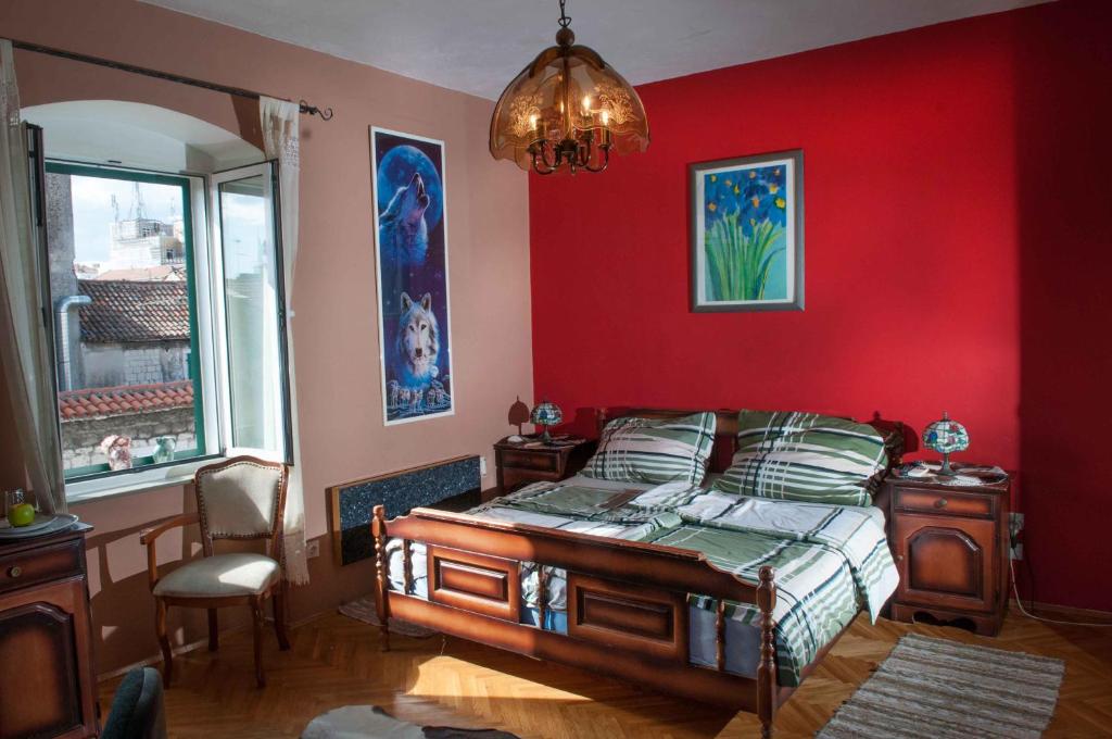 Postel nebo postele na pokoji v ubytování Buga And Tuga Rooms