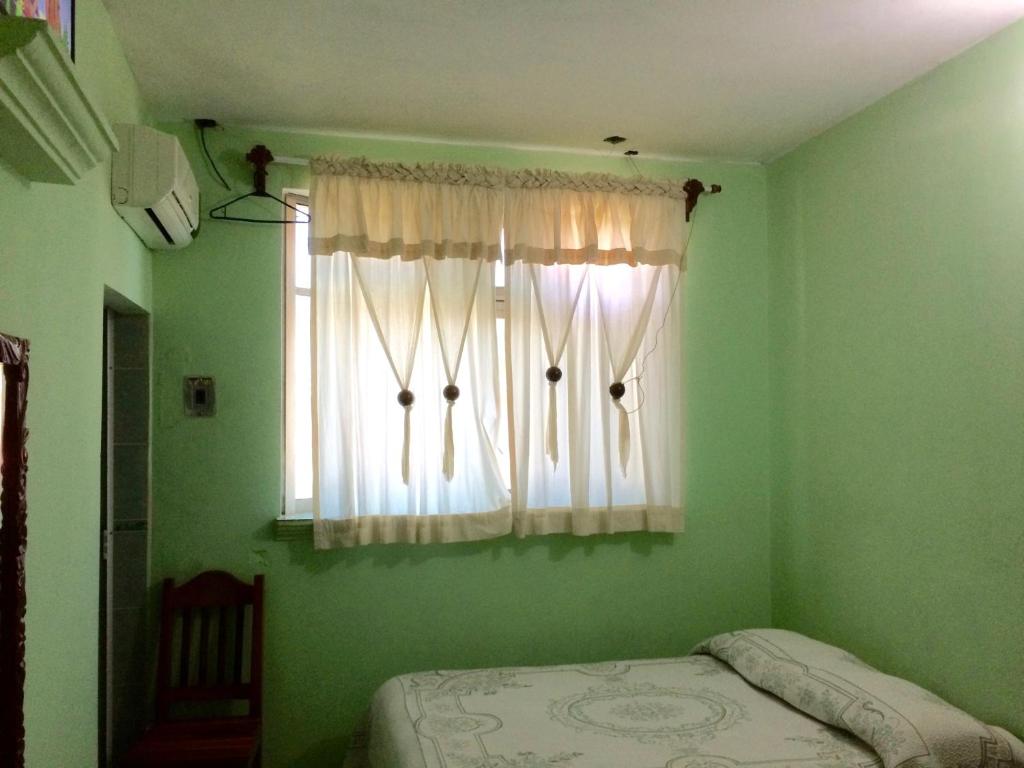 Postel nebo postele na pokoji v ubytování Hotel Cosoleacaque Centro
