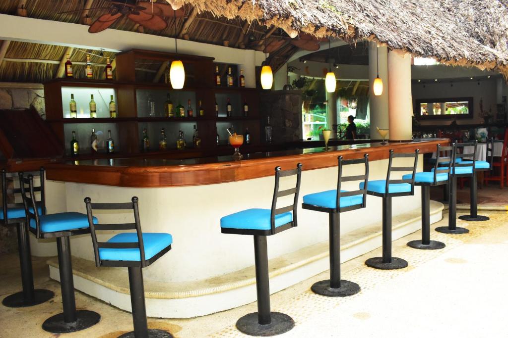 Lounge nebo bar v ubytování Hotel Casa Iguana Mismaloya