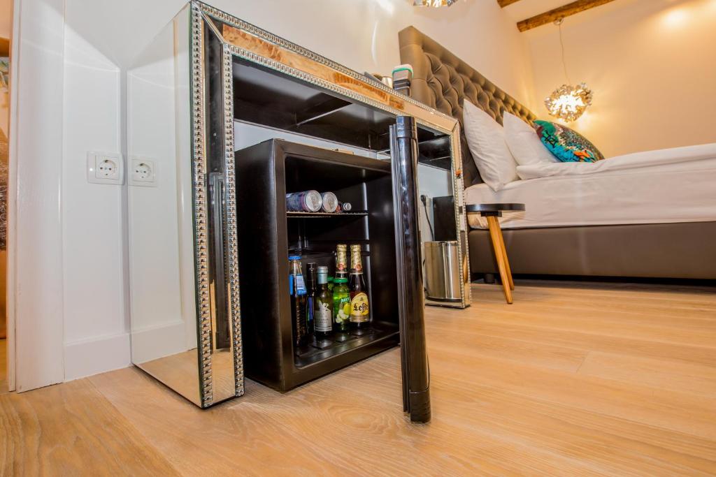 Posteľ alebo postele v izbe v ubytovaní Spalato Luxury Rooms
