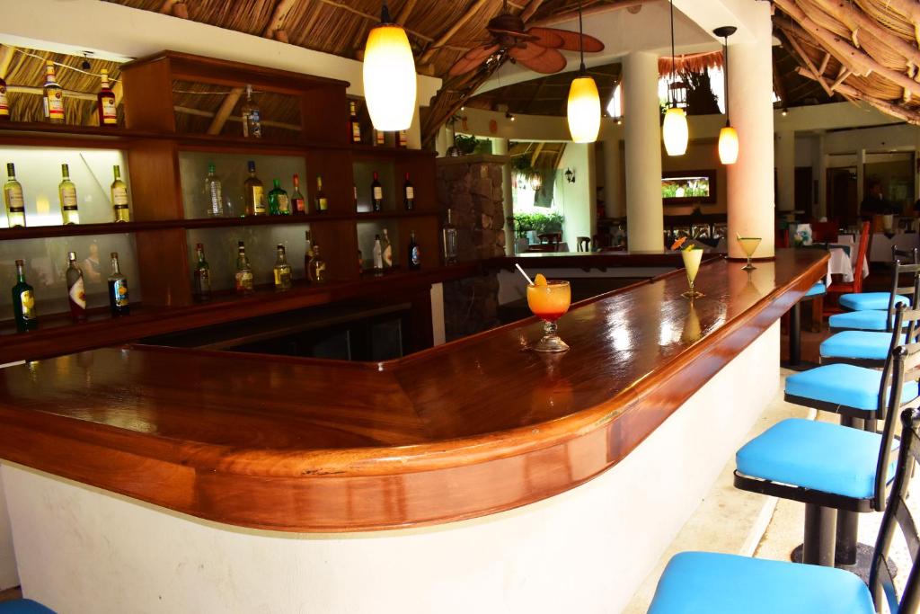 Lounge nebo bar v ubytování Hotel Casa Iguana Mismaloya