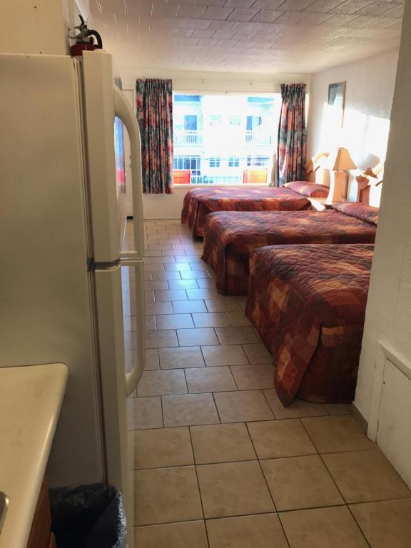 Postel nebo postele na pokoji v ubytování El Ray Motel