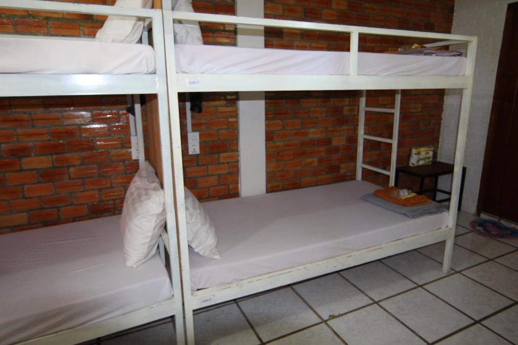 Palanda nebo palandy na pokoji v ubytování Naga Angkor Hostel