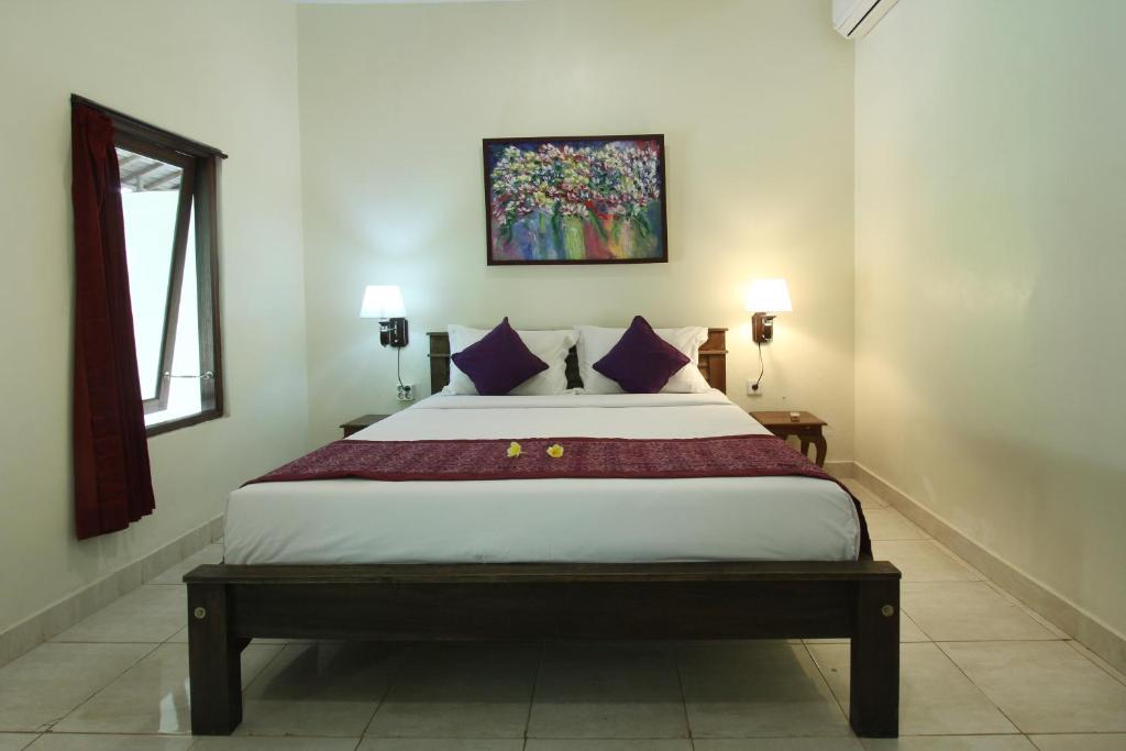 Postel nebo postele na pokoji v ubytování Nara Ubud Cottage by Mahaputra