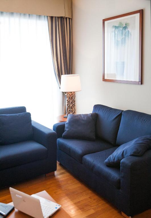 Posezení v ubytování Cosmo Residence