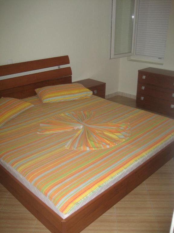 Postel nebo postele na pokoji v ubytování Guest House Vila Mimoza