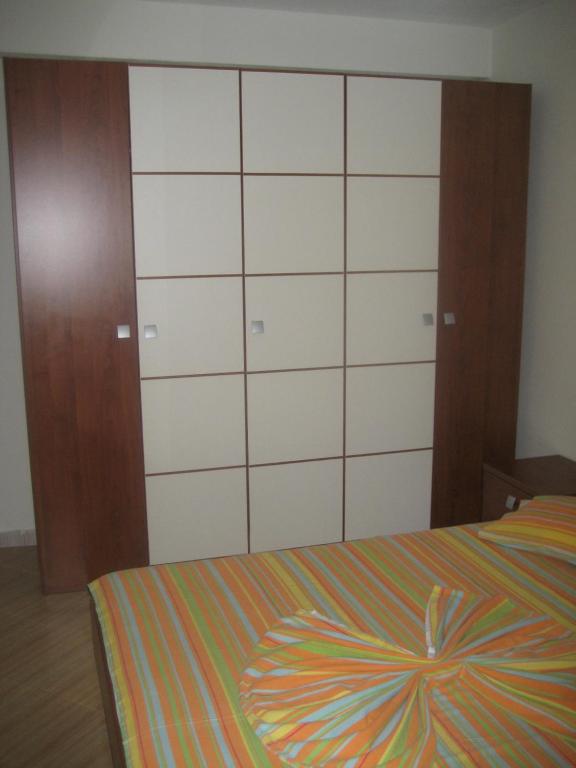 Postel nebo postele na pokoji v ubytování Guest House Vila Mimoza