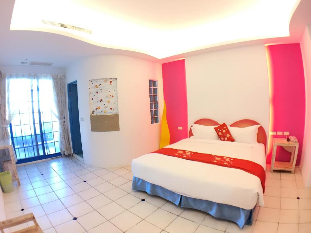 Postel nebo postele na pokoji v ubytování Yujian Kending Tese Homestay