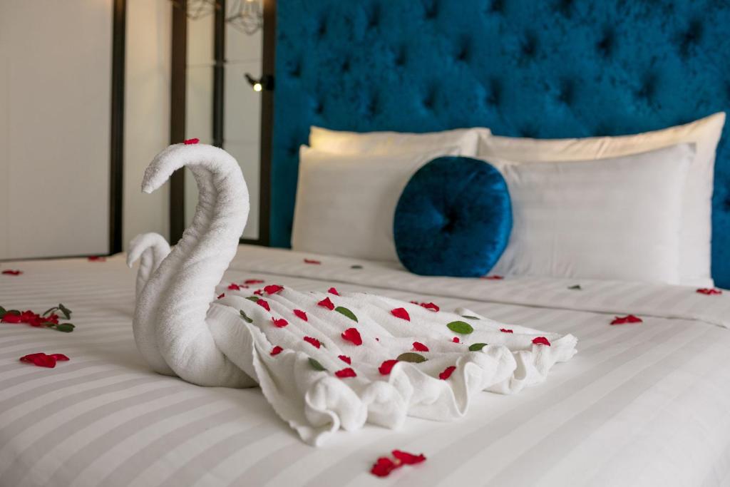 Postel nebo postele na pokoji v ubytování Serene Boutique Hotel & Spa
