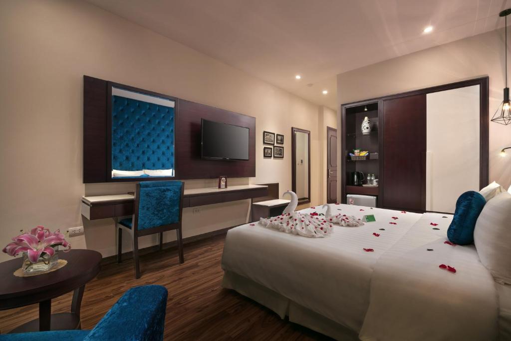 Postel nebo postele na pokoji v ubytování Serene Boutique Hotel & Spa