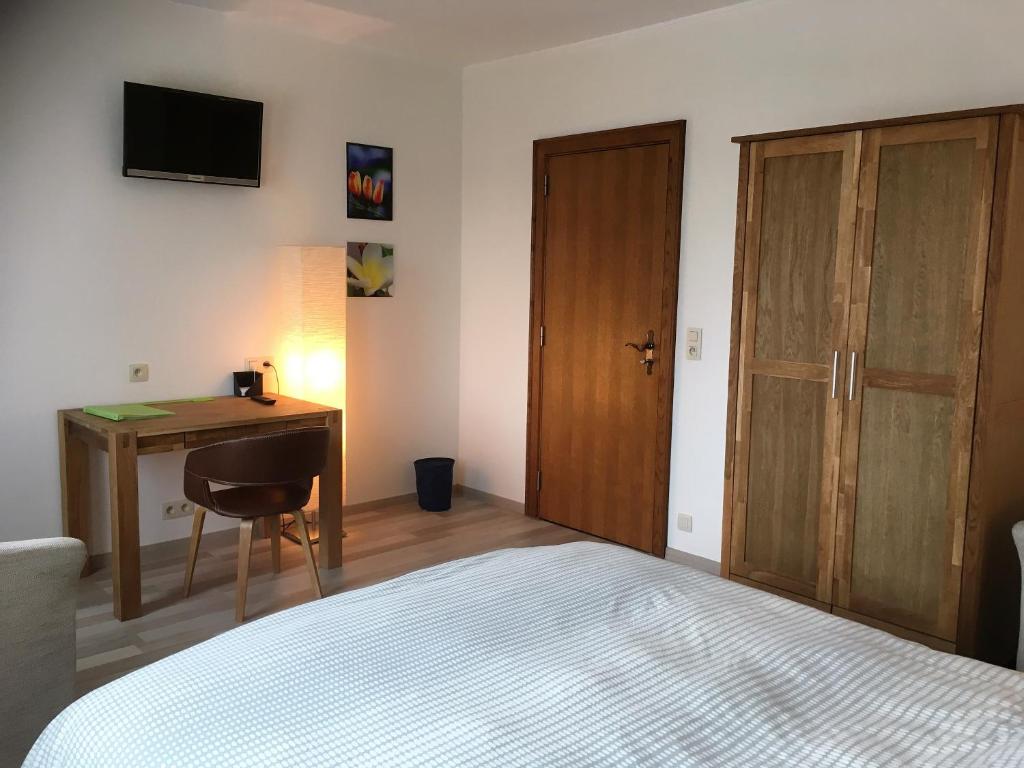 Postel nebo postele na pokoji v ubytování Hotel Schröder