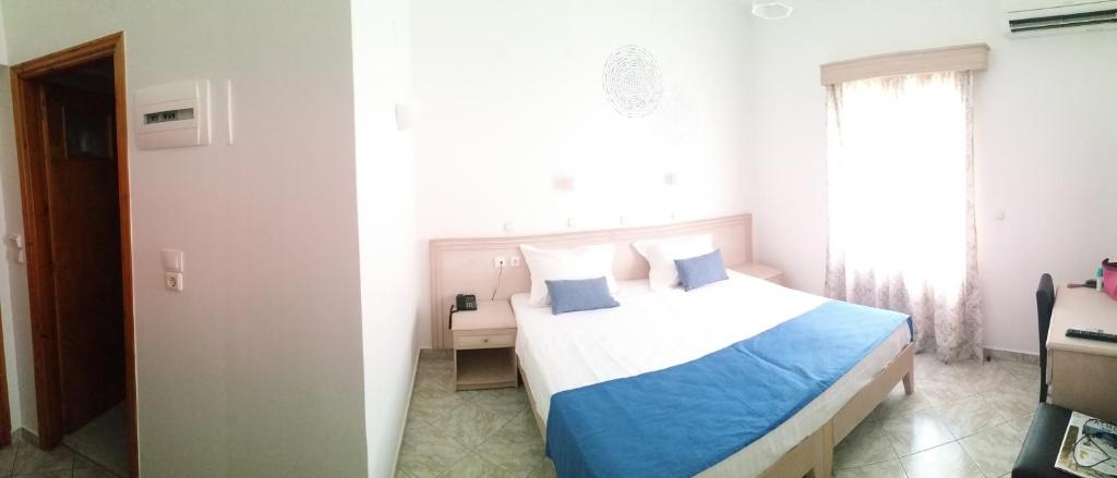 Postel nebo postele na pokoji v ubytování Armyra Hotel