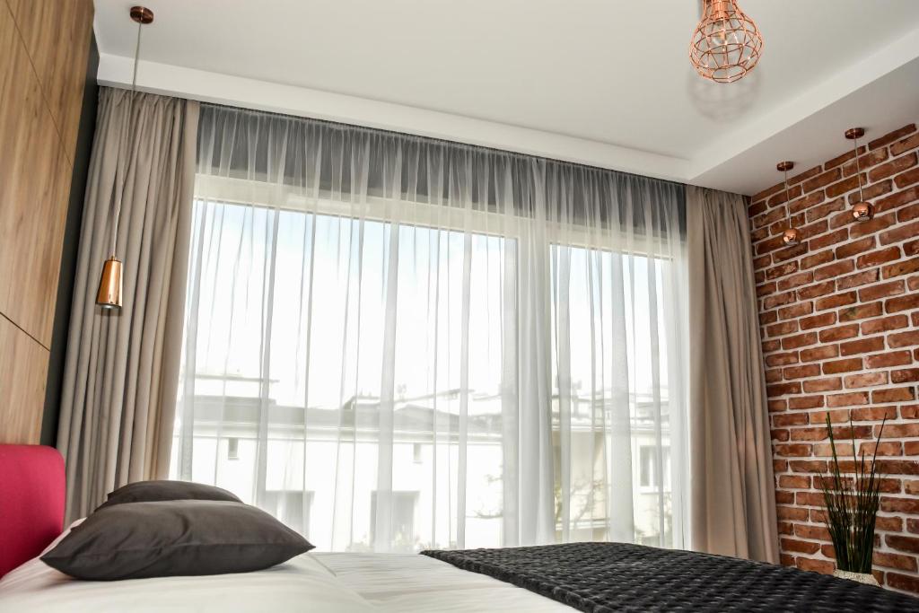 Posteľ alebo postele v izbe v ubytovaní Apartament 34 Gdynia KLIMATYZOWANY