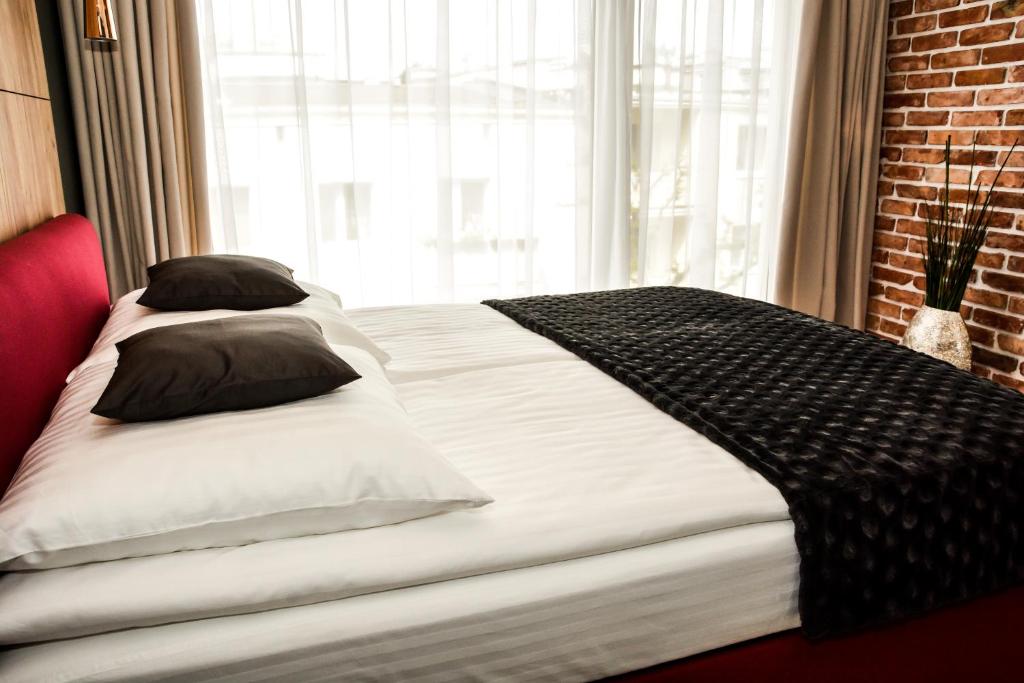 Posteľ alebo postele v izbe v ubytovaní Apartament 34 Gdynia KLIMATYZOWANY