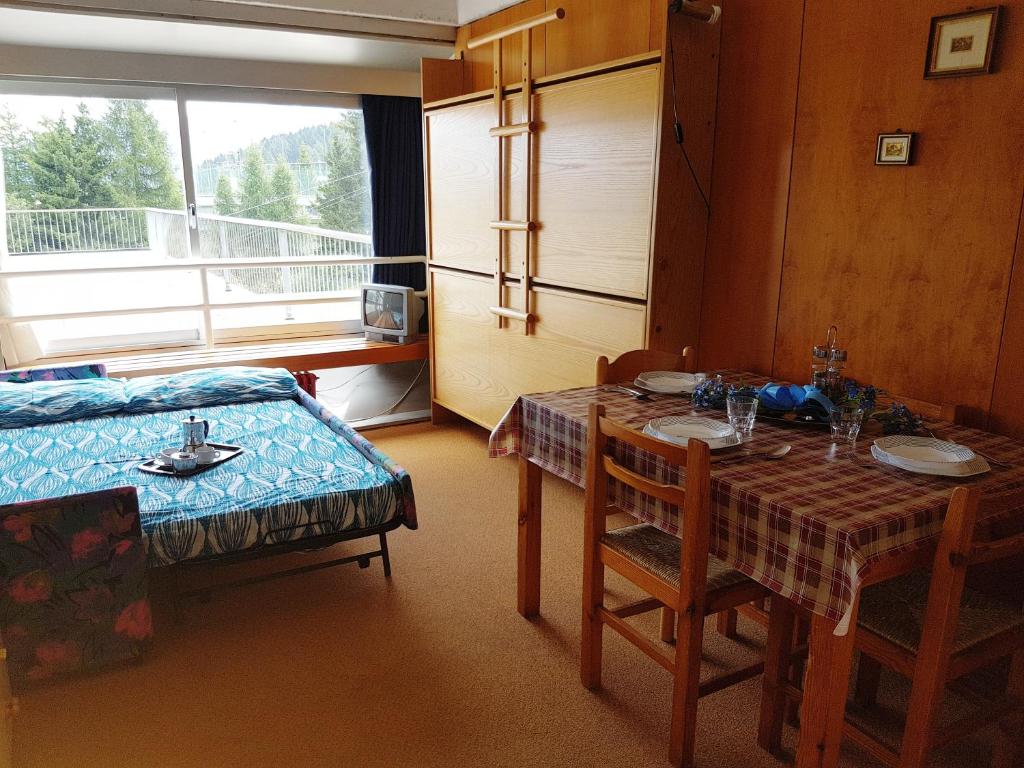 Posezení v ubytování Res. Marilleva 1400 Apt.Solandra