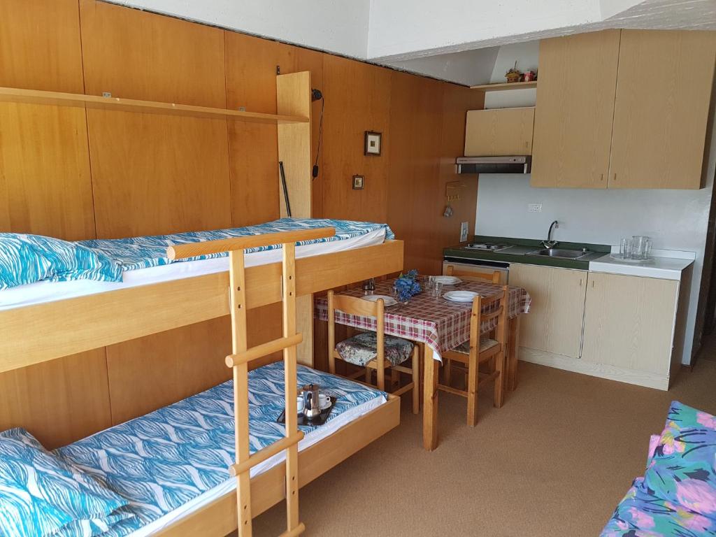 Kuchyň nebo kuchyňský kout v ubytování Res. Marilleva 1400 Apt.Solandra