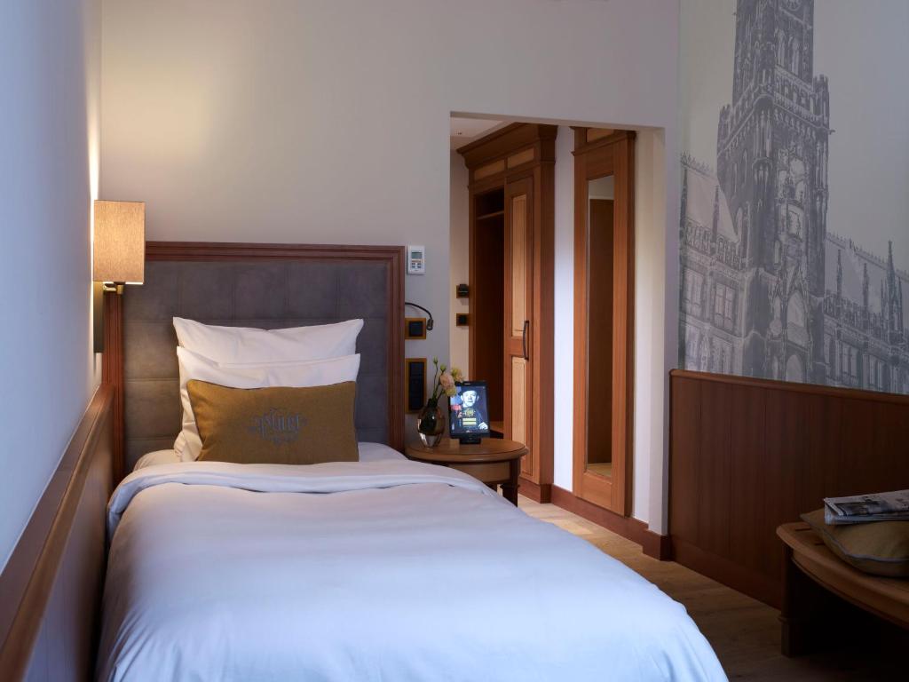 Postel nebo postele na pokoji v ubytování Platzl Hotel - Superior