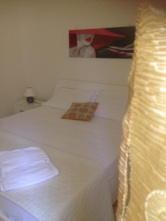 Postel nebo postele na pokoji v ubytování Mirage B&B