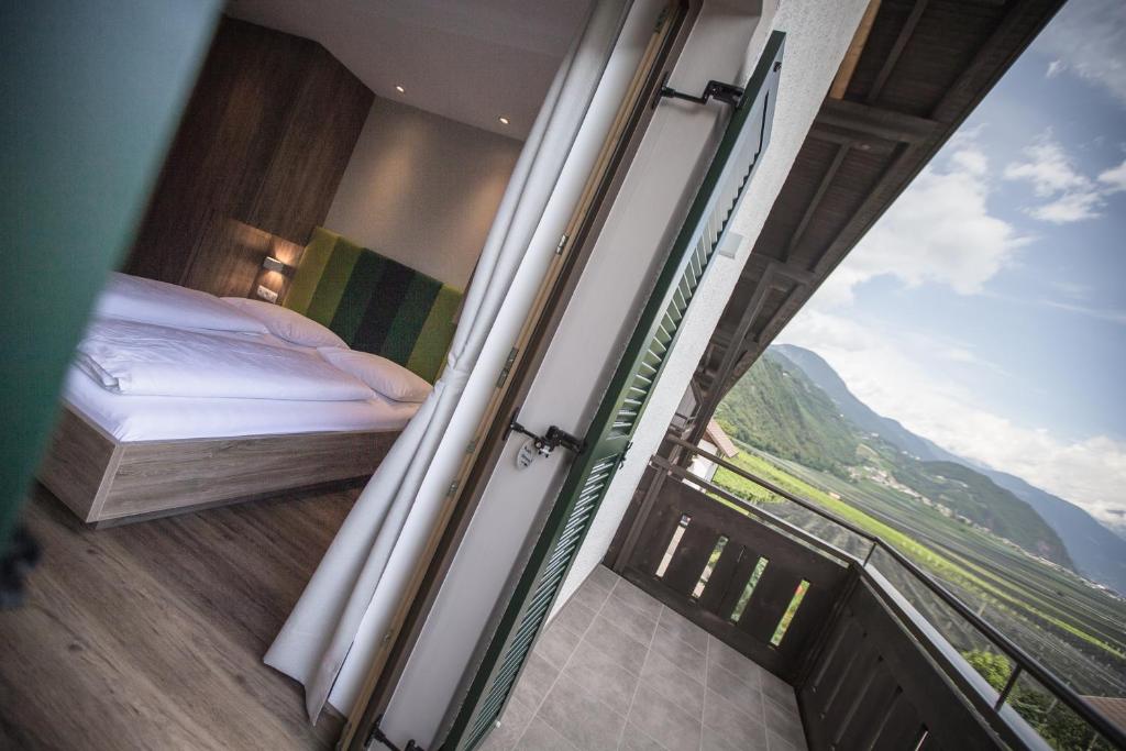Postel nebo postele na pokoji v ubytování Hotel Garni Andrianerhof