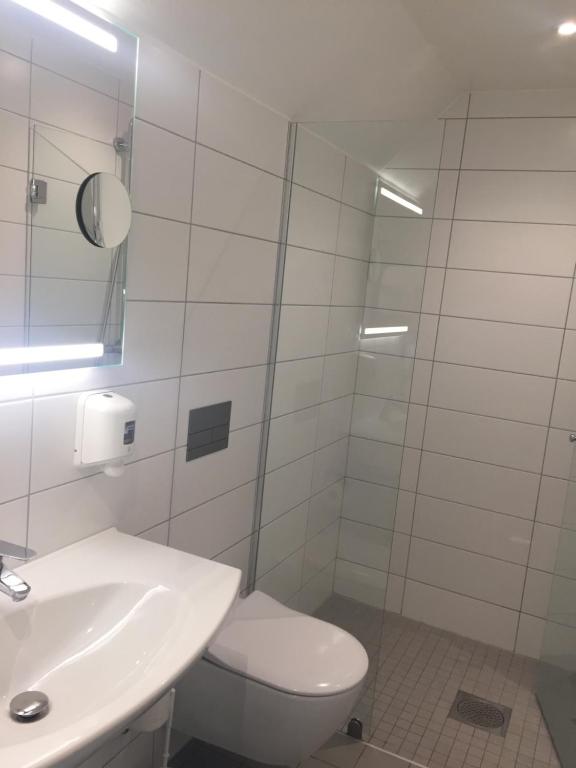 Koupelna v ubytování Quality Hotel Olavsgaard