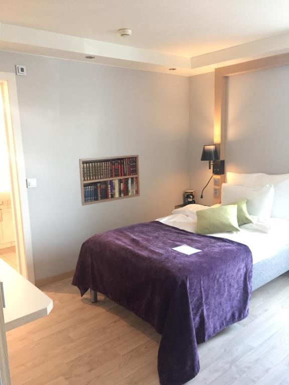Postel nebo postele na pokoji v ubytování Quality Hotel Olavsgaard