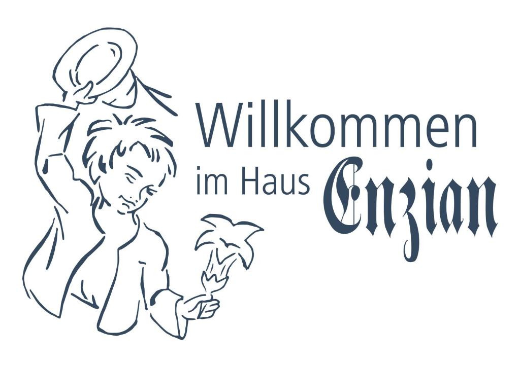 Ein Mann mit einer Ananas und eine Frau mit der Inschrift willushima im hat Kapitän in der Unterkunft Fewo Enzian in Bach